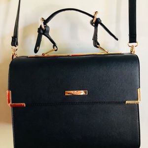 Dune Black Bag with gold hardware..never used